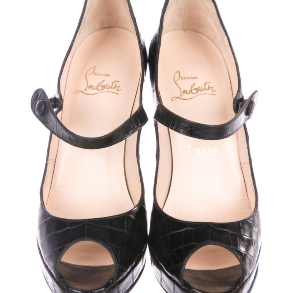 Christian Louboutin leather embossed pumps